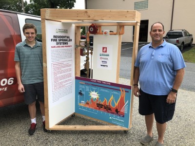 AGF Intern Ryan Overton (Left) and Jim McHugh (right) with a completed NFPA 13D Display